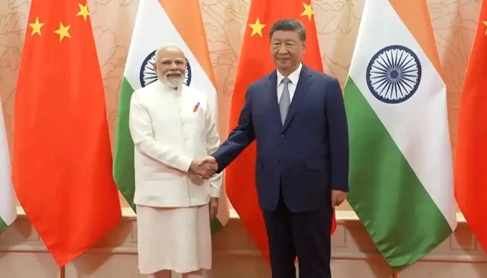 चीन में जिनपिंग से मिले पीएम मोदी, कहा- सीमा पर सैनिकों की वापसी से शांति का माहौल बना